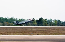Royal Australian Air Force Squadron Leader Andrew Jackson, F-35 Lightning II student pilot, lands his F-35A after completing his first flight on Eglin Air Force Base, Fla., March 18, 2015. Jackson arrived in the United States in December 2014 and started his training at the F-35 Academic Training Center on Jan. 26, Australia Day. Since then, Jackson has completed 154 classroom hours and 64 hours throughout 16 flight simulations, before stepping to his first aircraft. (U.S. Air Force photo/Staff Sgt. Marleah Robertson)