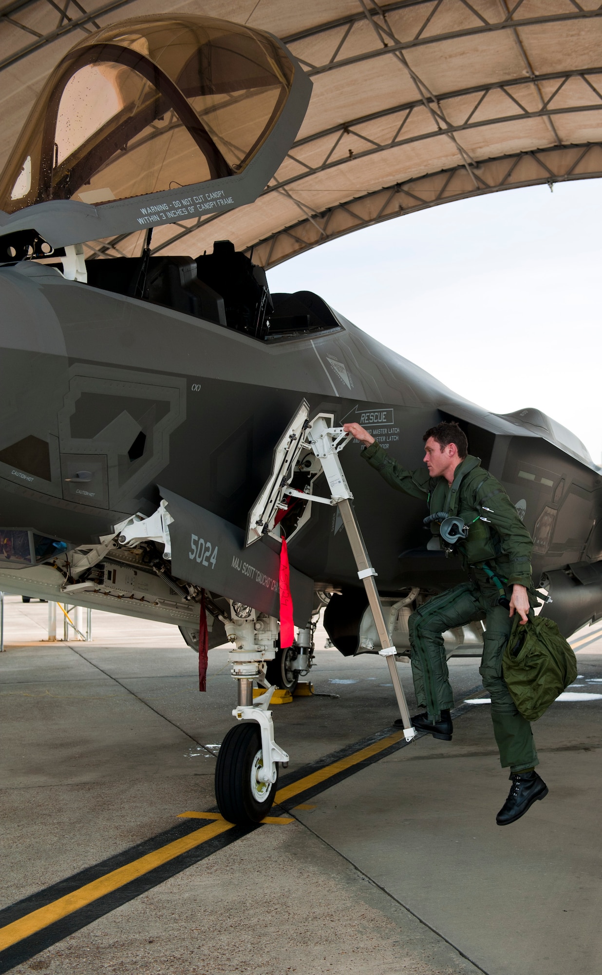 Royal Australian Air Force Squadron Leader Andrew Jackson, F-35 Lightning II student pilot, exits his F-35A after completing his first flight on Eglin Air Force Base, Fla., March 18, 2015. Jackson made history as the first Australian pilot to fly in the F-35A. The fifth-generation aircraft will meet Australia’s future air combat and strike needs, providing a networked force-multiplier effect in terms of situational awareness and combat effectiveness. (U.S. Air Force photo/Staff Sgt. Marleah Robertson)