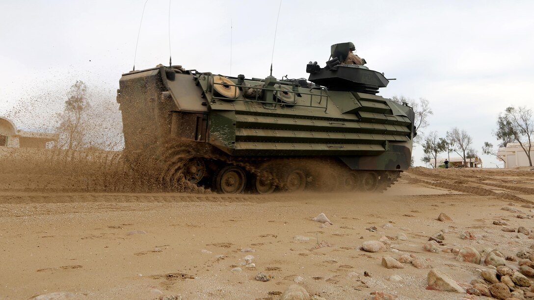 A U.S. Marine Amphibious Assault Vehicle from Kilo Company, Battalion Landing Team 3rd Battalion, 6th Marine Regiment, 24th Marine Expeditionary Unit, moves to its objective during Exercise Eagle Resolve 2015 at Failaka Island, Kuwait, March 24, 2015. Eagle Resolve is the premiere Arabian Peninsula/gulf region exercise among the United States, Gulf Cooperation Council nations, and international partners. It serves to address regional challenges associated with asymmetric/unconventional warfare in a multi-national environment. 