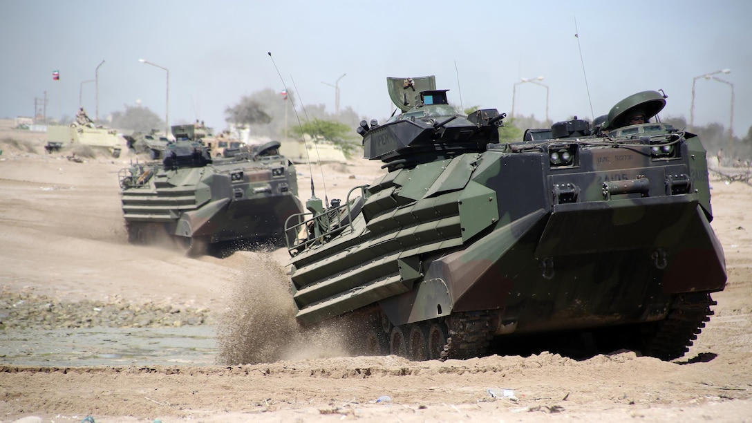 U.S. Marine Amphibious Assault Vehicles from Kilo Company, Battalion Landing Team 3rd Battalion, 6th Marine Regiment, 24th Marine Expeditionary Unit, move to their objective during a simulated amphibious assault as part ofExercise Eagle Resolve 2015at Failaka Island, Kuwait, March 24, 2015. Eagle Resolve is the premiere Arabian Peninsula/gulf region exercise among the United States, Gulf Cooperation Council nations, and international partners. It serves to address regional challenges associated with asymmetric/unconventional warfare in a multi-national environment.