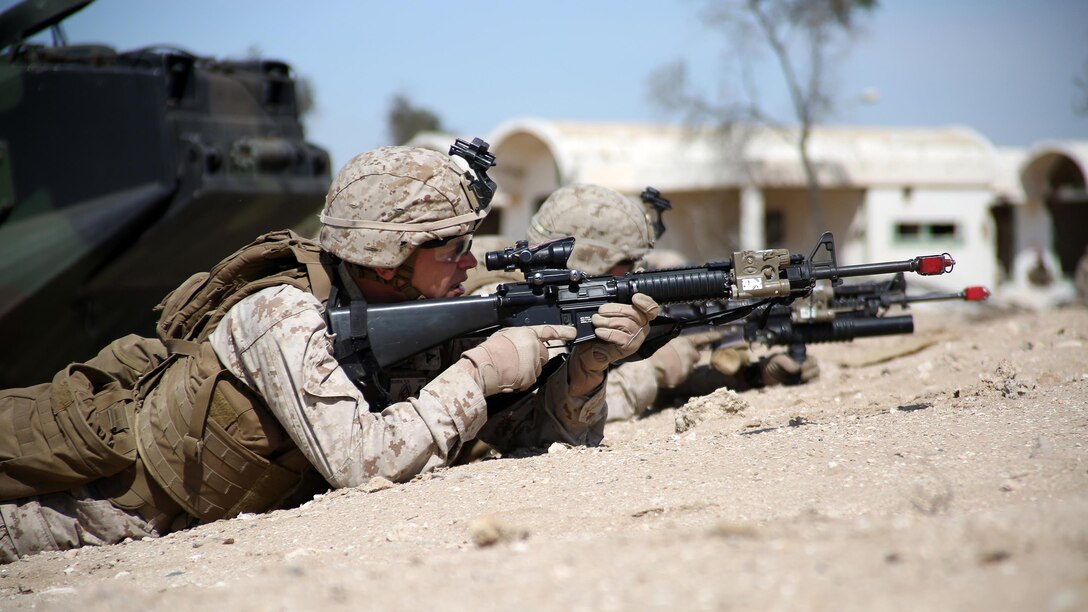 U.S. Marines with Kilo Company, Battalion Landing Team 3rd Battalion, 6th Marine Regiment, 24th Marine Expeditionary Unit, prepare to assault a simulated objective during Exercise Eagle Resolve 2015 at Failaka Island, Kuwait, March 24, 2015. Eagle Resolve is the premiere Arabian Peninsula/gulf region exercise among the United States, Gulf Cooperation Council nations, and international partners. It serves to address regional challenges associated with asymmetric/unconventional warfare in a multi-national environment. 