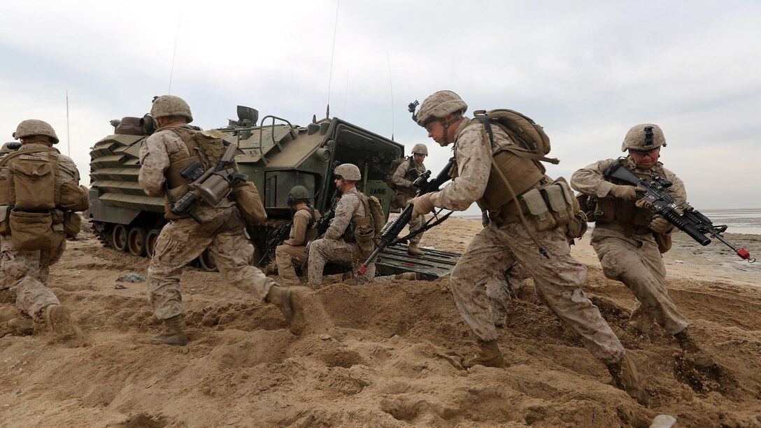 U.S. Marines with Kilo Company, Battalion Landing Team 3rd Battalion, 6th Marine Regiment, 24th Marine Expeditionary Unit, move to their objective during an simulated amphibious assault as a part of Exercise Eagle Resolve 2015at Failaka Island, Kuwait, March 24, 2015. Eagle Resolve is the premiere Arabian Peninsula/gulf region exercise among the United States, Gulf Cooperation Council nations, and international partners. It serves to address regional challenges associated with asymmetric/unconventional warfare in a multi-national environment. 