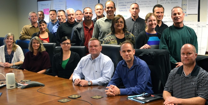Members of the Air Reserve Personnel Center gather for a group photo during an off-site conference to prepare the new 2015 Strategic Plan, Dec. 10-11, 2014. (U.S. Air Force photo/Lt. Col. Belinda Petersen)