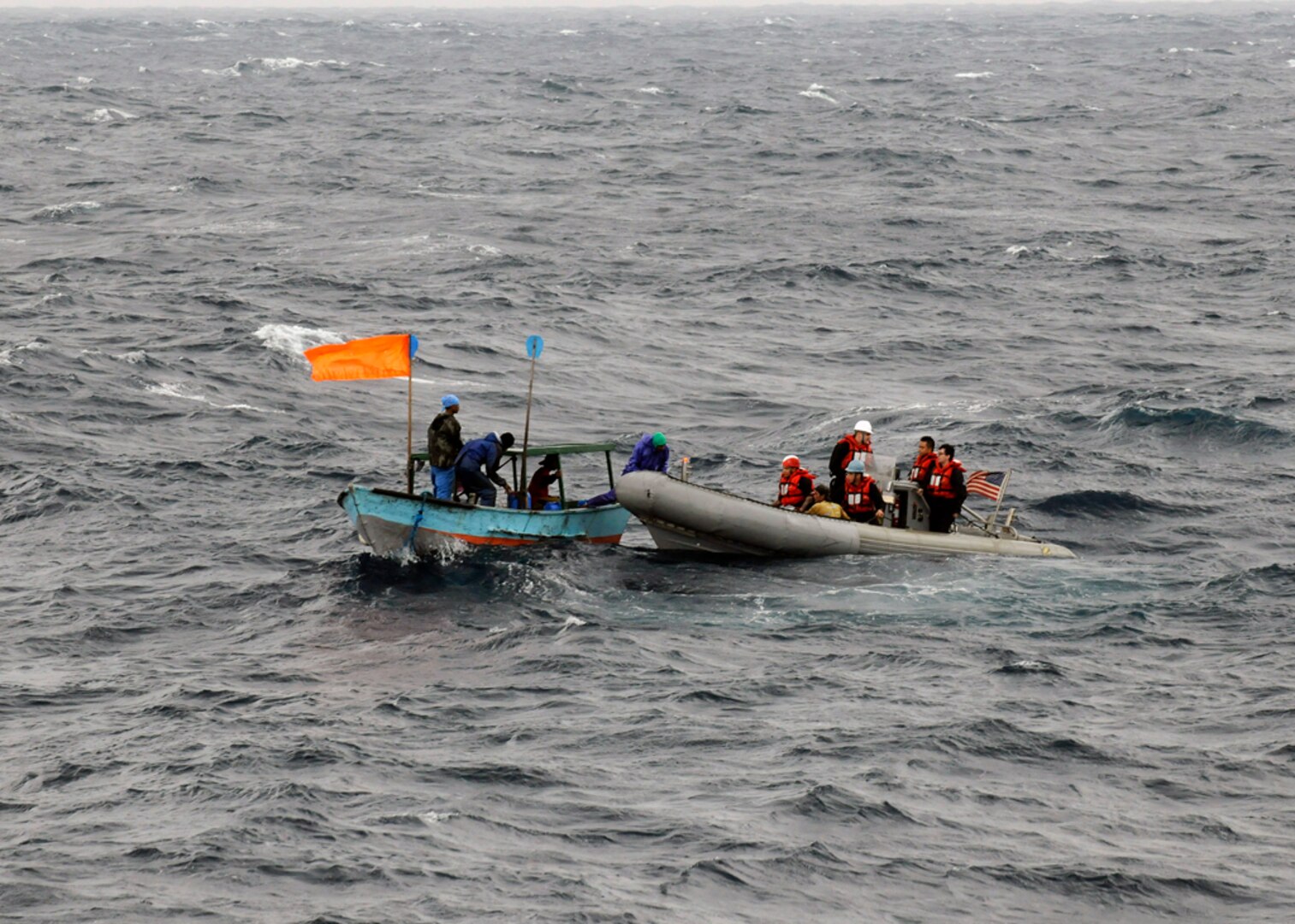 PHILIPPINE SEA (Mar. 25, 2015) - Sailors attached to the U.S. 7th Fleet flagship USS Blue Ridge (LCC 19), rescue five stranded Filipino nationals. Blue Ridge is currently on patrol strengthening and fostering relationships within the Indo-Asian Pacific region.  