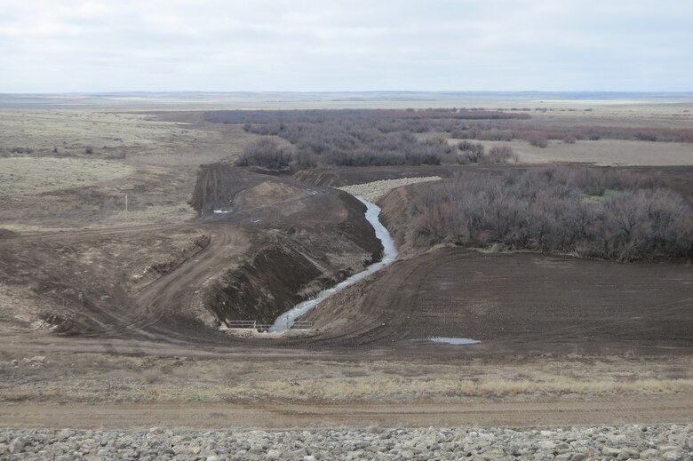 ROSWELL, N.M. – A view of the completed project from the top of Diamond A Dam, March 5, 2015.  The new erosion-control rip rap is seen in the middle of the photo.
