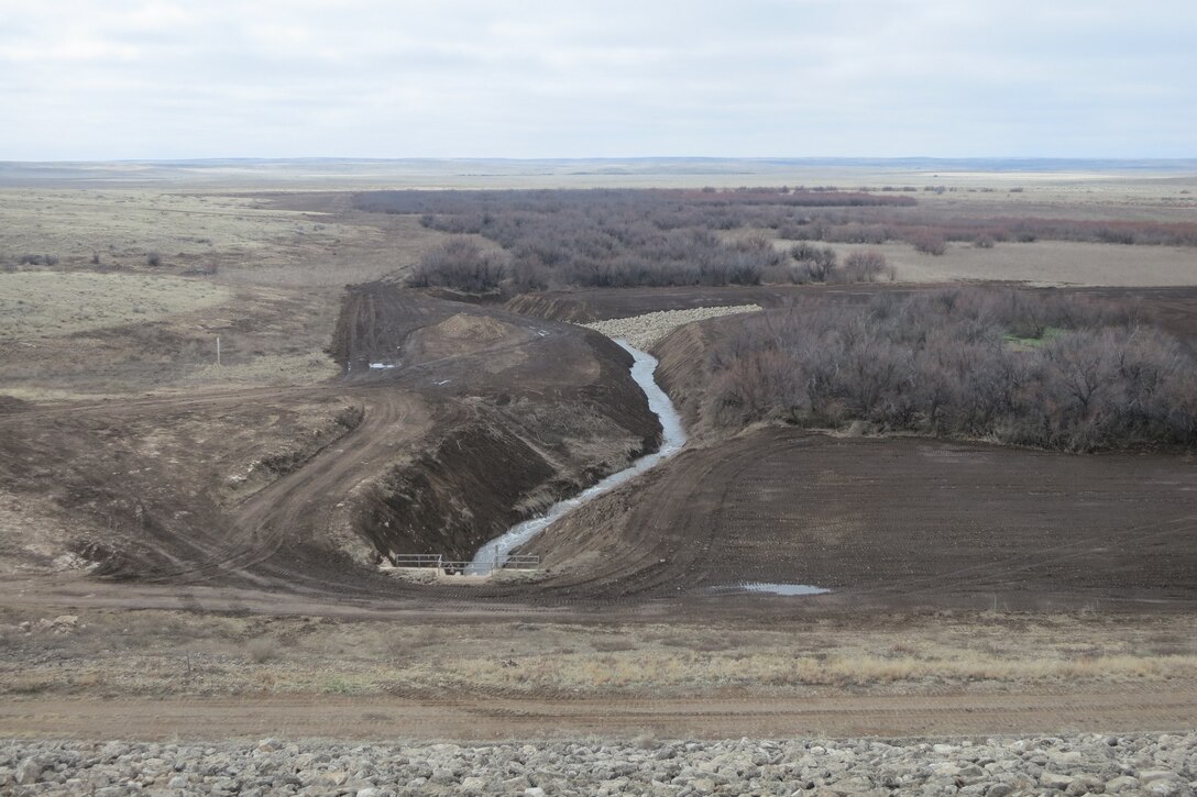 ROSWELL, N.M. – A view of the completed project from the top of Diamond A Dam, March 5, 2015.  The new erosion-control rip rap is seen in the middle of the photo.
