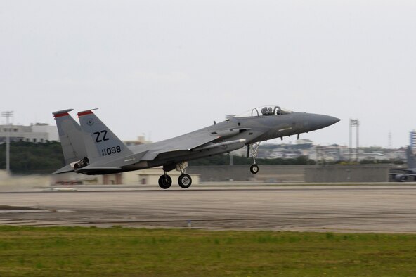 A U.S. Air Force F-15C Eagle from the 67th Fighter Squadron takes off during a sortie surge on Kadena Air Base, Japan, March 25, 2015. Normally, the unit flies about 22 sorties per day, but during a surge, the unit will try to fly 75 or more sorties in one day. (U.S. Air Force photo by Staff Sgt. Marcus Morris)