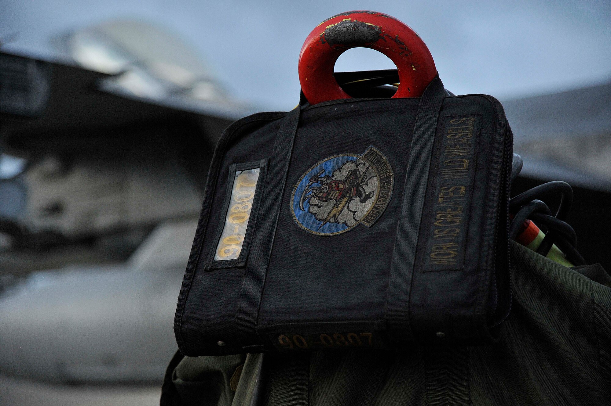 A technical order binder belonging to a crew chief from the 14th Fighter Squadron rests on a fuel cart at Misawa Air Base, Japan, Mar. 25, 2015. Technical orders are the guides maintenance personnel use to perform checks on their aircraft to ensure it is in operating condition. Consultation often involves a detailed checklist, giving the crew guidance on what to inspect with their pilot. (U.S. Air Force photo by Airman 1st Class Patrick S. Ciccarone/Released)