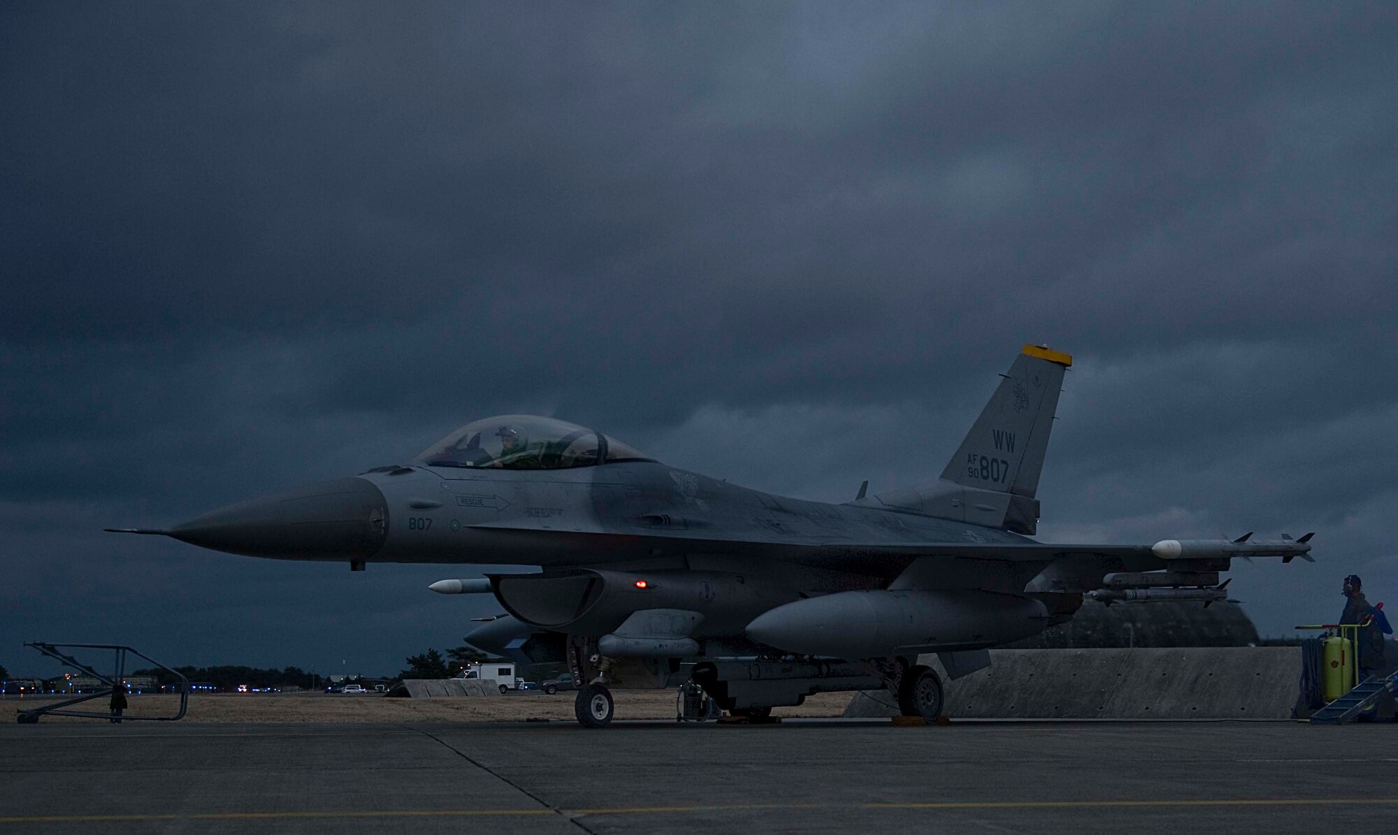 U.S. Air Force Airman 1st Class Caleb Woriax, 14th Aircraft Maintenance Squadron crew chief, conducts a pre-flight inspection on an F-16 Fighting Falcon at Misawa Air Base, Japan, Mar. 25, 2015. Crew chiefs work closely with pilots and are the last to touch a jet before takeoff and the first to touch when it lands. (U.S. Air Force photo by Airman 1st Class Jordyn Rucker/Released)