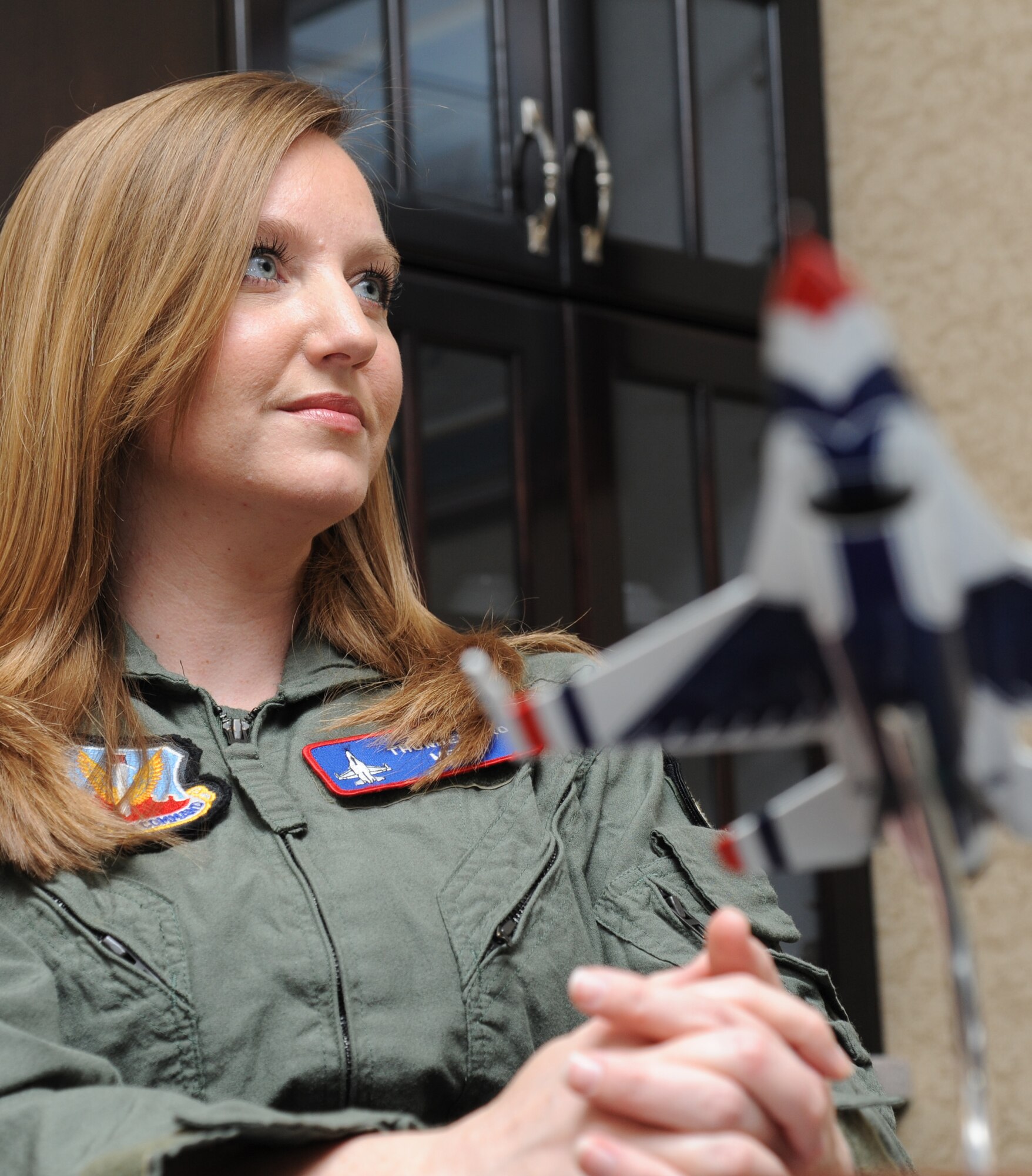 Meggan Gray, WLOX anchor, receives flight training March 26, 2015, at Keesler Air Force Base, Miss., in preparation for a media flight with the U.S. Air Force Thunderbirds March 27.  The Thunderbirds are headlining Keesler’s 2015 Air Show/Open House to be held March 28-29.  (U.S. Air Force photo by Kemberly Groue)