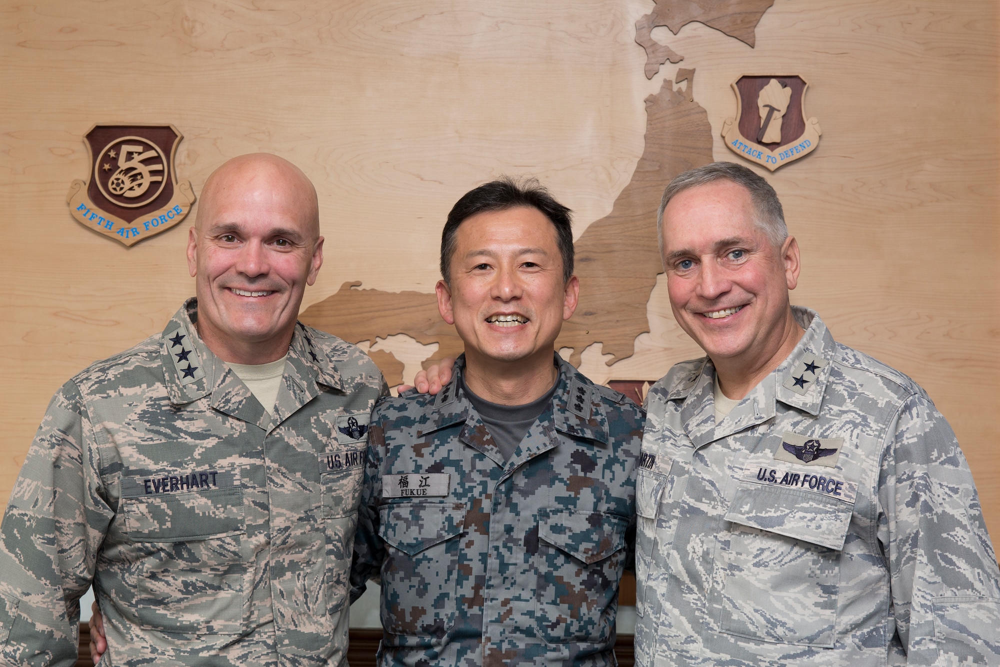 (Left to right) U.S. Air Force Lt. Gen. Carlton D. Everhart II, 18th Air Force commander, Japan Air Self-Defense Force Lt. Gen. Hiroaki Fukue, Air Support Command commander, and Air Force Maj. Gen. Frederick Martin, U.S. Air Force Expeditionary Center commander, pose for a photo in the Fifth Air Force headquarters after an office call at Yokota Air Base, Japan, March 26, 2015. Everhart and Martin visited Yokota during their official visit to mobility Airmen throughout the Pacific theater. (U.S. Air Force photo by Osakabe Yasuo/Released)