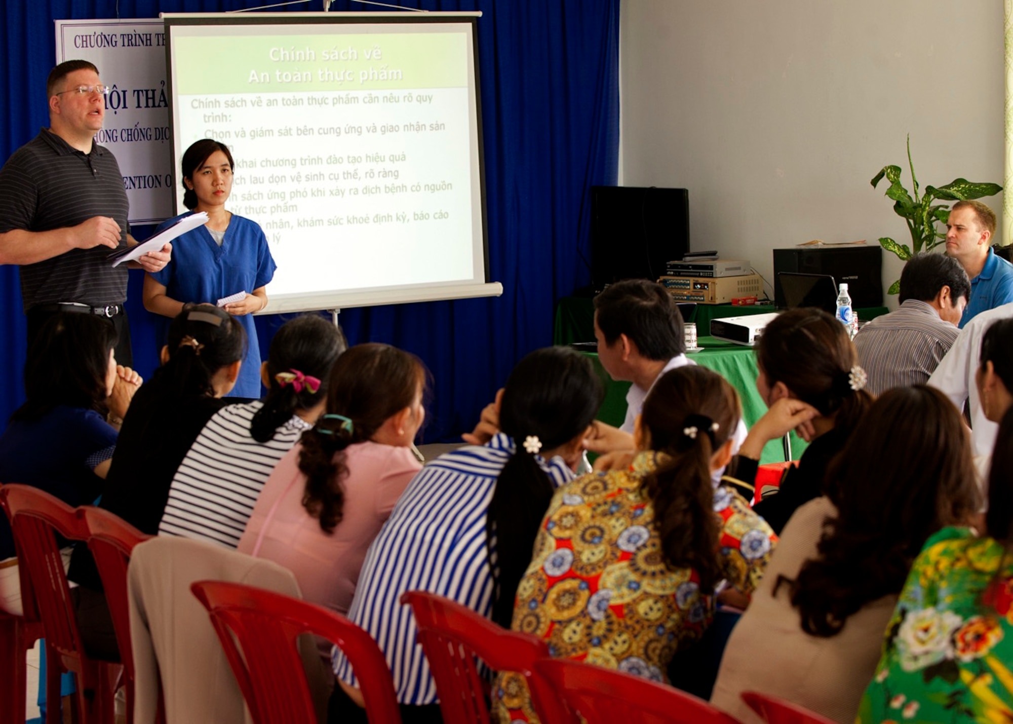 U.S. Air Force Tech. Sgt. Jeremy Hussey, 18th Medical Group Public Health technician, Kadena Air Base, Japan, teaches food safety during a three day subject matter expert exchange at Quang Ngai Province, Vietnam, March 26, 2015. The annual regional humanitarian assistance and disaster relief operation is part of Operation Pacific Angel 15-3 and provided general health, dental, optometry, pediatrics, and engineering programs to the local people, which helped to foster host nation and multilateral partnership.