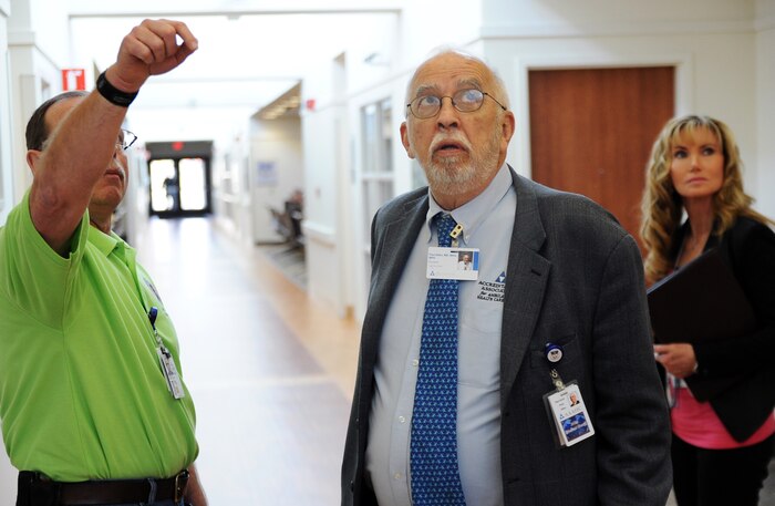 Mr. Rod Madison, (left), 341 Medical Group facility manager, Dr. Paul M Allen, and Dr. Joy Himmel, tour the clinic during an Accreditation Association of Ambulatory Health Care inspection, Mar. 24, 2015, at Malmstrom Air Force Base, Mont.  More than 3,000 ambulatory health care organizations across the United States are accredited by AAAHC.  (U.S. Air Force photo/Chris Willis)