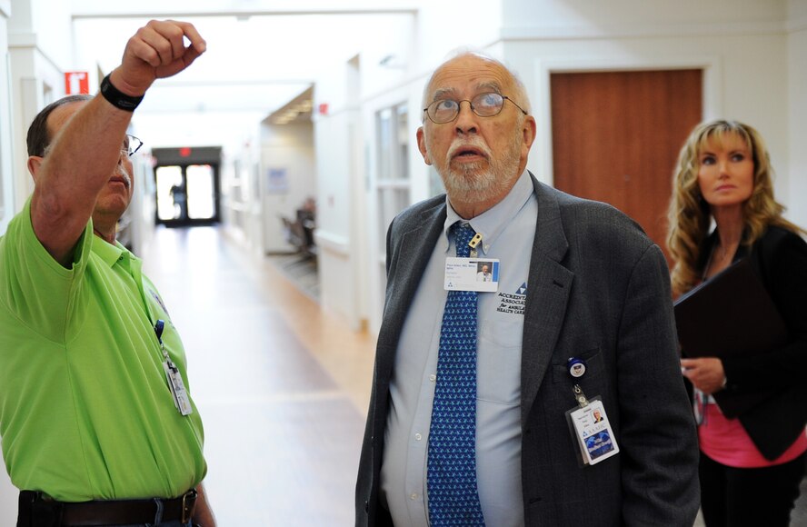 Mr. Rod Madison, (left), 341 Medical Group facility manager, Dr. Paul M Allen, and Dr. Joy Himmel, tour the clinic during an Accreditation Association of Ambulatory Health Care inspection, Mar. 24, 2015, at Malmstrom Air Force Base, Mont.  More than 3,000 ambulatory health care organizations across the United States are accredited by AAAHC.  (U.S. Air Force photo/Chris Willis)