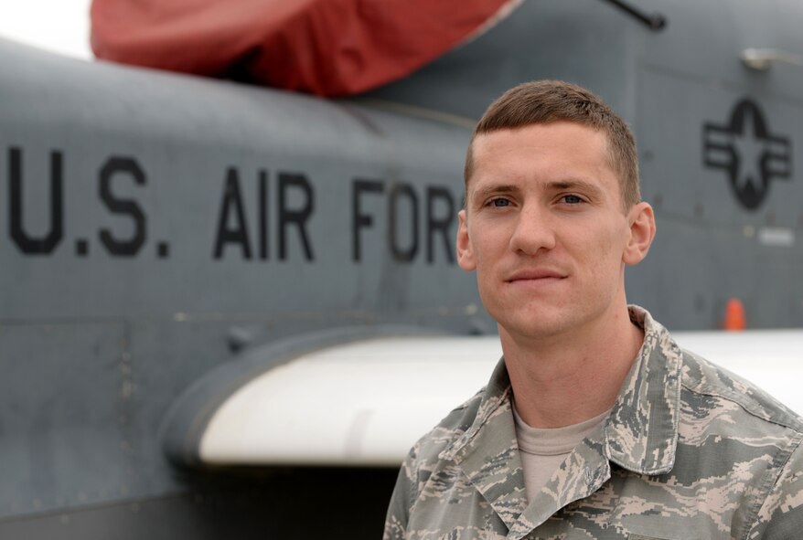 Senior Airman Benjamin Ryan, 9th Contracting Squadron contract specialist, on the flightline at Beale Air Force Base, Calif., March, 24, 2015. He was recently selected to attend Officer Training School at Maxwell Air Force Base, Ala. (U.S. Air Force photo by Senior Airman Bobby Cummings/Released)