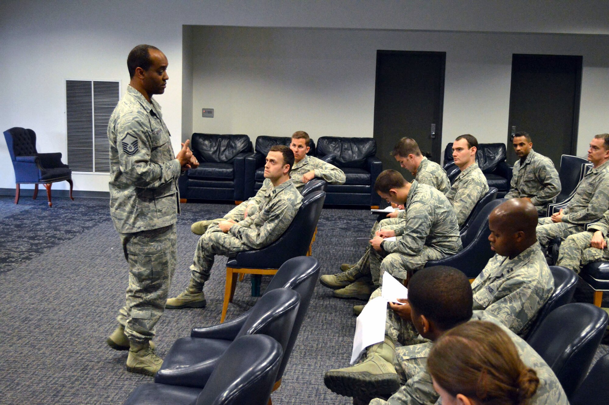 Master Sgt. Dexter Robinson, 43rd Force Support Squadron career assistance advisor, left, provides remarks during a company-grade officer professional development seminar Mar. 19 at the Airman’s Center, Pope Army Airfield, N.C. (U.S. Air Force photo/Marvin Krause)