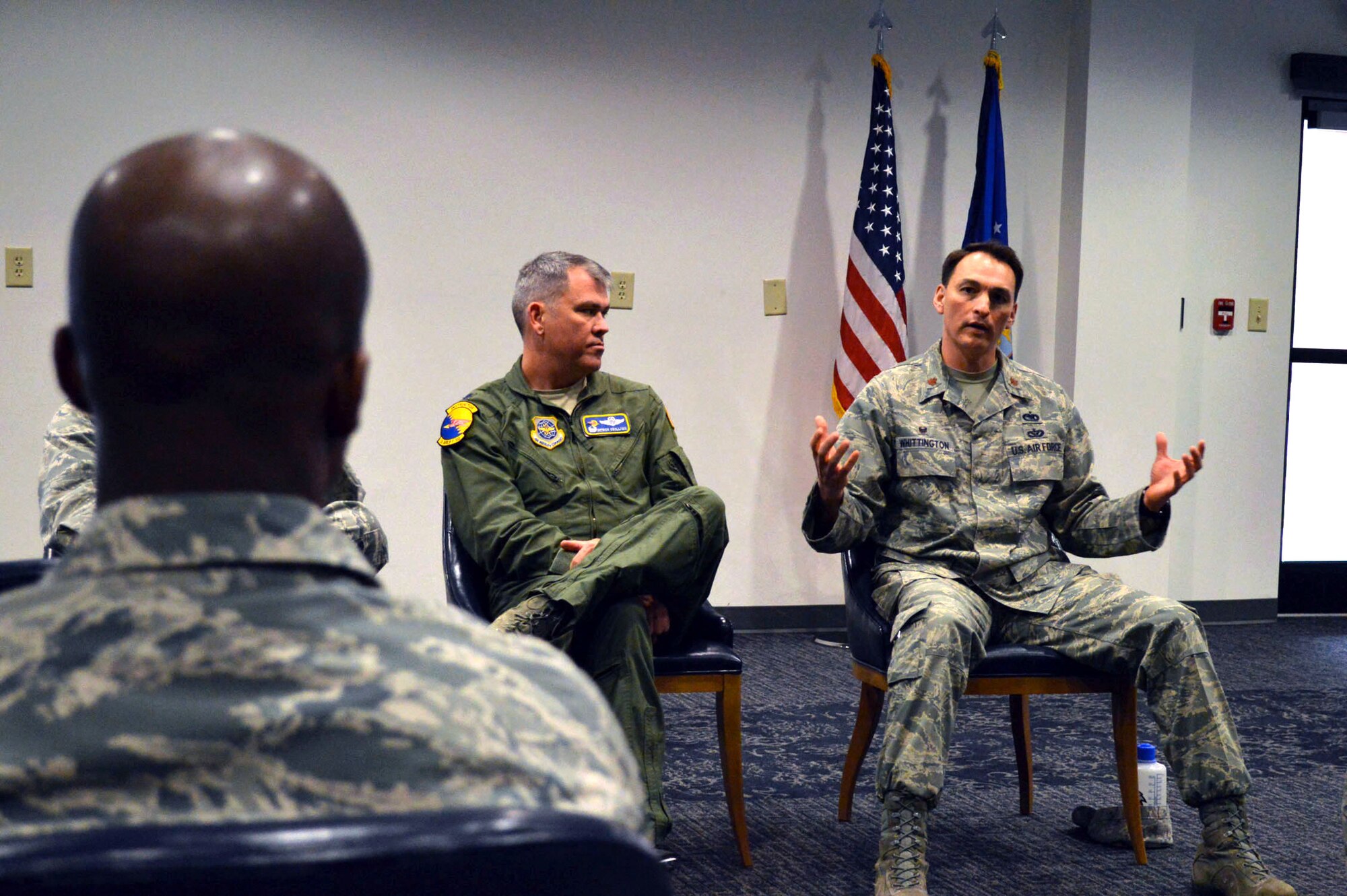 Maj. Joseph Whittington, 3rd Aerial Port Squadron commander, right, answers a question during a company-grade officer professional development seminar commanders’ panel Mar. 19 at the Airman’s Center, Pope Army Airfield, N.C. while Lt. Col. Patrick O’Sullivan, 2nd Airlift Squadron commander listens. (U.S. Air Force photo/Marvin Krause)

