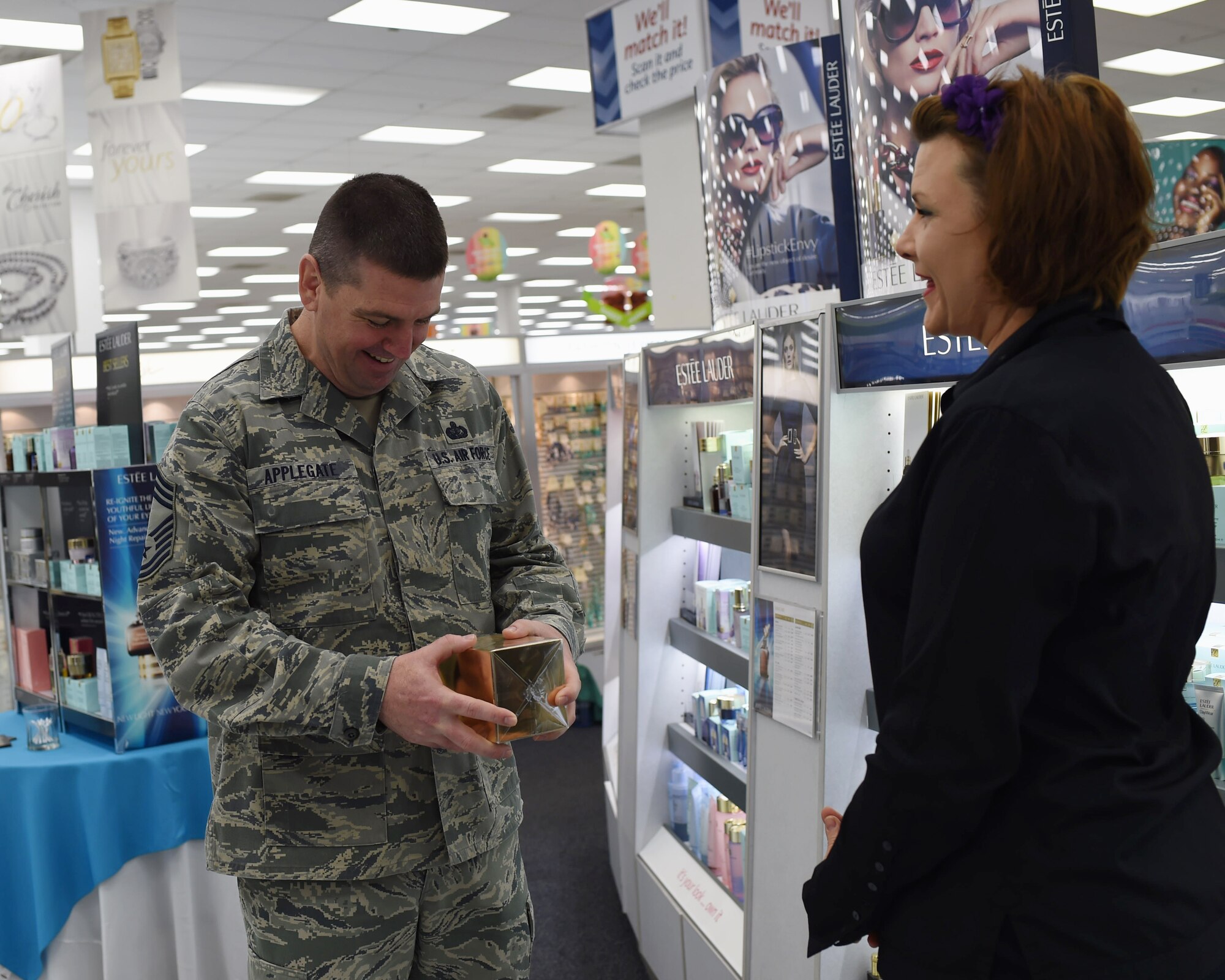 Air Force Chief Master Sgt. Sean Applegate, Army and Air Force Exchange Service senior enlisted advisor, speaks with exchange workers March 26, 2015, on Buckley Air Force Base, Colo.  The senior leader spoke with the group on how The Exchange can better serve the community. (U.S. Air Force photo by Airman 1st Class Samantha Saulsbury/Released)