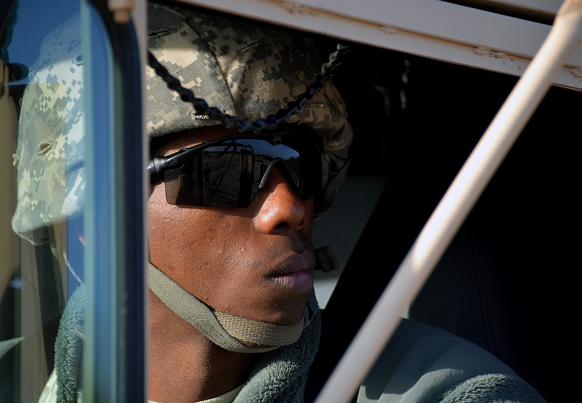 A Soldier from the 688th Rapid Port Opening Element, based out of Fort Eustis, Virginia, focuses on uploading cargo from a Heavy Expanded Mobility Tactical Truck (HEMITT), March 10, 2015, during Exercise EAGLE FLAG 15-2, at Joint Base McGuire-Dix-Lakehurst, New Jersey. Exercise EF is designed for developing, testing and rehearsing the expeditionary combat support of capabilities of Department of Defense contingency response units. (U.S. Air Force photo by Senior Airman Charles Rivezzo)