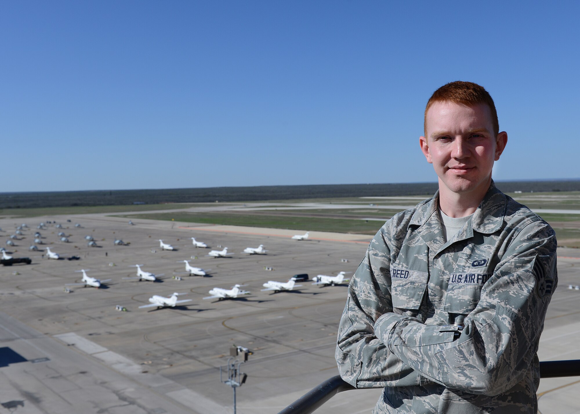 Senior Airman Oliver Reed, 47th Operations Support Squadron air traffic controller, poses for a photo at Laughlin Air Force Base, Texas, March 23, 2015. Reed was accepted into the Airman Scholarship Commissioning Program, a program that allows enlisted Airmen to attend school full time for their bachelor’s degree and join the Reserve Officers’ Training Corps. After school and training, members come back to the Air Force as an officer. (U.S. Air Force photo by Airman 1st Class Jimmie D. Pike)(Released)