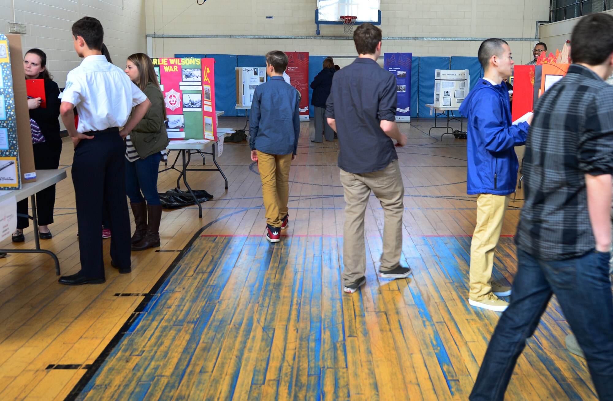 Students from local Department of Defense Dependent Schools present projects during the National History Day competition at Royal Air Force Lakenheath High School, England, March 25, 2015. NHD is a long-term program that helps students learn proper research techniques through different projects such as websites, documentaries, written presentations and performances. This year’s theme was “Leadership and Legacy in History.” (Air Force photo by Airman 1st Class Dawn M. Weber/Released)