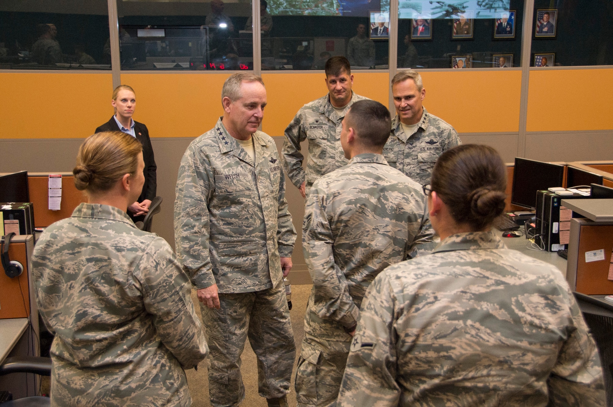 Air Force Chief of Staff Gen. Mark A. Welsh III, speaks with Airmen in the Air Mobility Division of the 612th Air Operations Center on March 25, 2015 at Davis-Monthan AFB, Ariz. The Airmen explained to Welsh what their division does and its importance for Air Forces Southern. (U.S. Air Force photo by Staff Sgt. Adam Grant/Released)