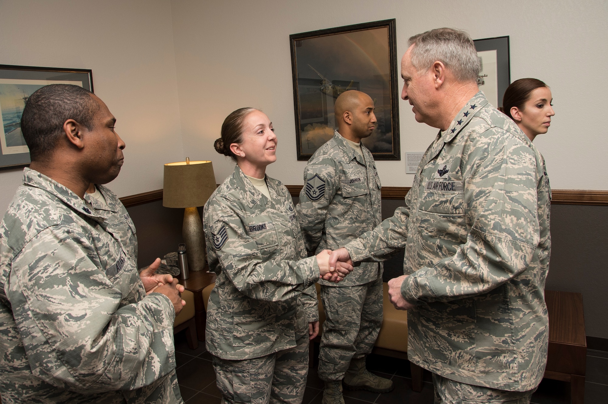 Air Force Chief of Staff Gen. Mark A. Welsh III, shakes hands with 12th Air Force (Air Forces Southern) outstanding Airmen on March 25, 2015 at Davis-Monthan AFB, Ariz. During his visit, Welsh visited the 355th Fighter Wing and spoke with active duty, Reserve and Guard Airmen. (U.S. Air Force photo by Staff Sgt. Adam Grant/Released)