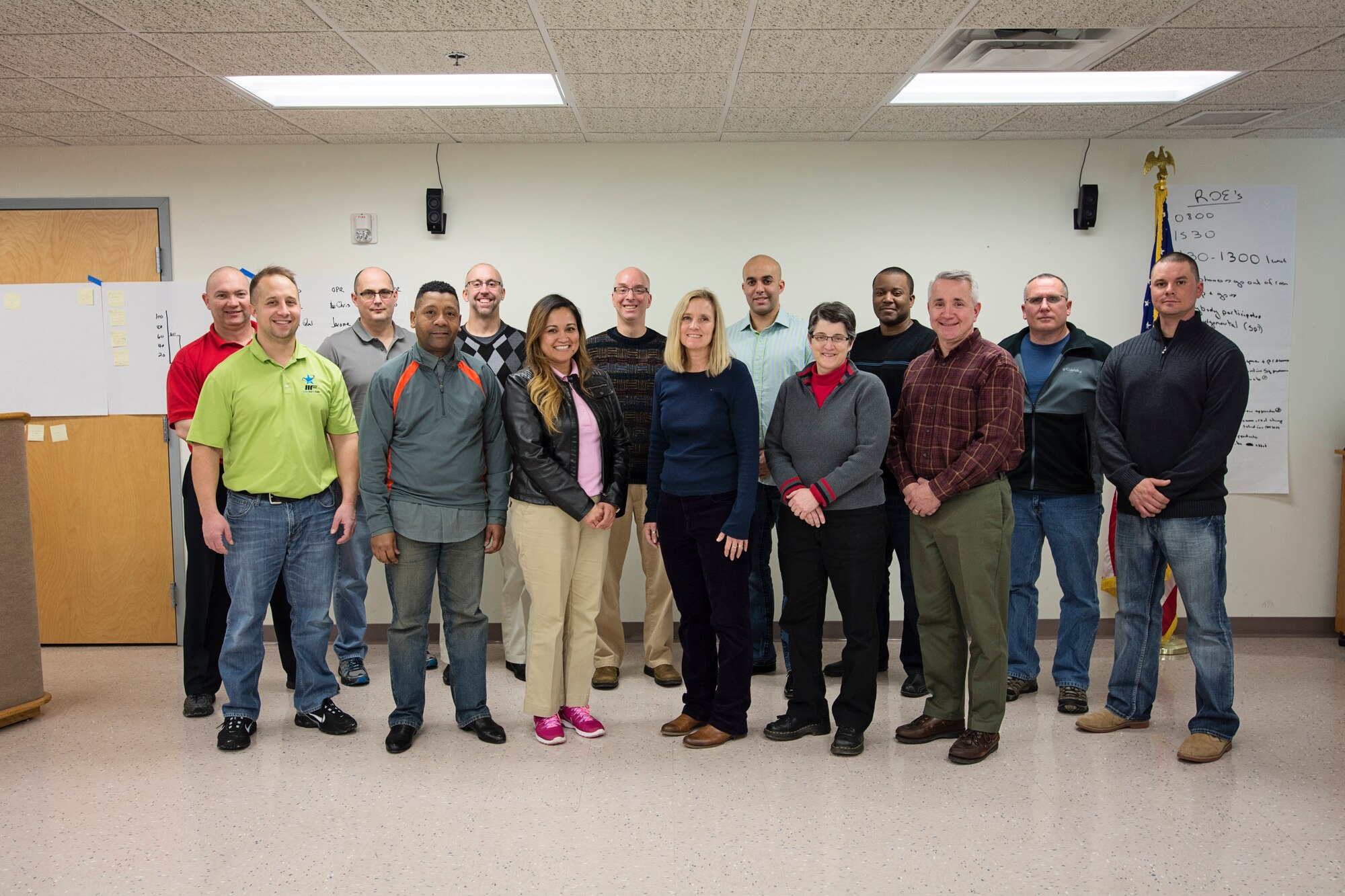 Members from the 512th Airlift Wing pose for a photo following the wing's first "Green Belt" academics class March 19, at Dover Air Force Base, Del., to support the Air Force Reserve Command's goals to grow organic capability to support their Continuous Process Improvement tools. The 13 wing members also learned the various roles and responsibilities of a green belt trainer, to help facilitate innovation of processes to improve how the Air Force operates.