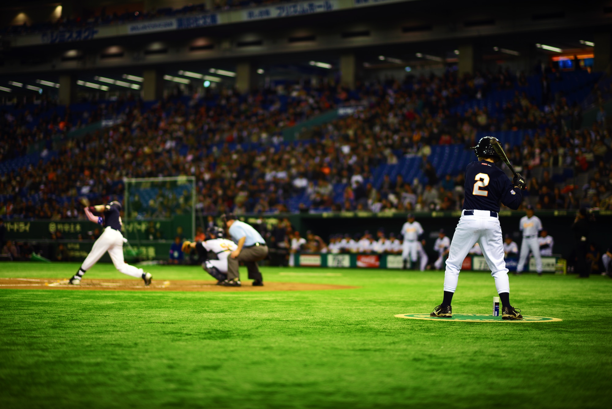A member of Team Jeter practices swinging a bat during the Tomodachi Charity Baseball Game, March 21, 2015, at the Tokyo Dome, Japan. The team was led by former Yankee, Derek Jeter, to raise awareness for children impacted by the Great East Japan Earthquake. (U.S. Air Force photo by Airman 1st Class Delano Scott/Released)