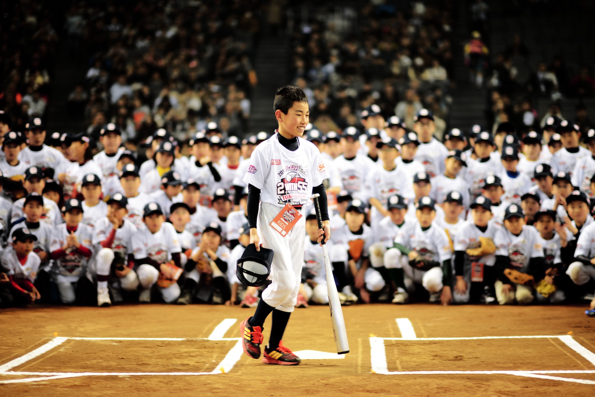 A child prepares to hit a baseball during a batting clinic taught by Derek Jeter and Hideki Matsui, March 21, 2015, at the Tokyo Dome, Japan. The former Yankees teammates partnered once more for the Tomodachi Charity Baseball. (U.S. Air Force photo by Airman 1st Class Delano Scott/Released)