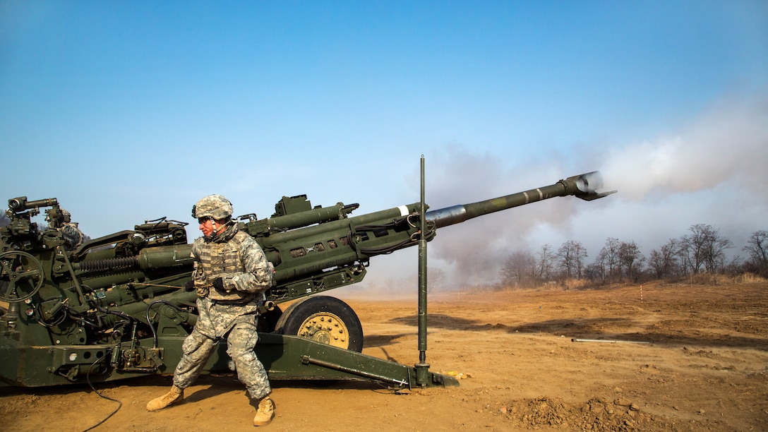 U.S. Army Pfc. Morros fires a M777A2 howitzer during field artillery training, part of exercise Foal Eagle 2015 on Warrior Base, New Mexico Range, South Korea, March 15, 2015. Morros is assigned to the 25th Infantry Division's 2nd Battalion, 11th Field Artillery Regiment, 2nd Stryker Brigade Combat Team.