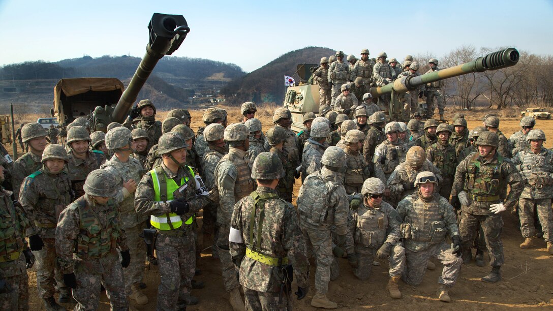 U.S. and South Korean soldiers conduct an after-action review following field artillery training during exercise Foal Eagle 2015 on Warrior Base, New Mexico Range, South Korea, March 15, 2015.