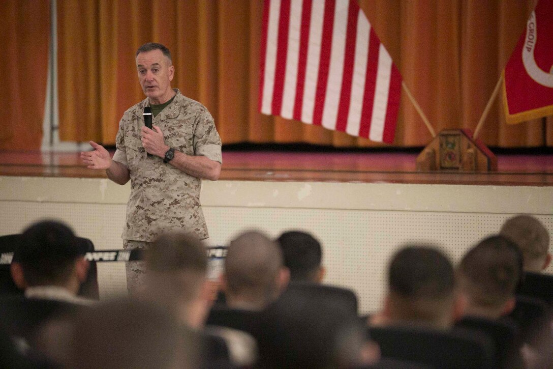 Gen. Joseph Dunford, the Commandant of the Marine Corps, speaks with Marines on Camp Hansen, Okinawa, March 26. Dunford traveled to the Marine bases on Okinawa from March 24 to the 26 to talk with Marines about his expectations for the Marines and the Corps. “My priorities are to make sure we have the warfighting capabilities we need, to address the maturity of our leaders and to make sure they have the training, education and the experience that they need to be successful on the battlefield,” said Dunford. 