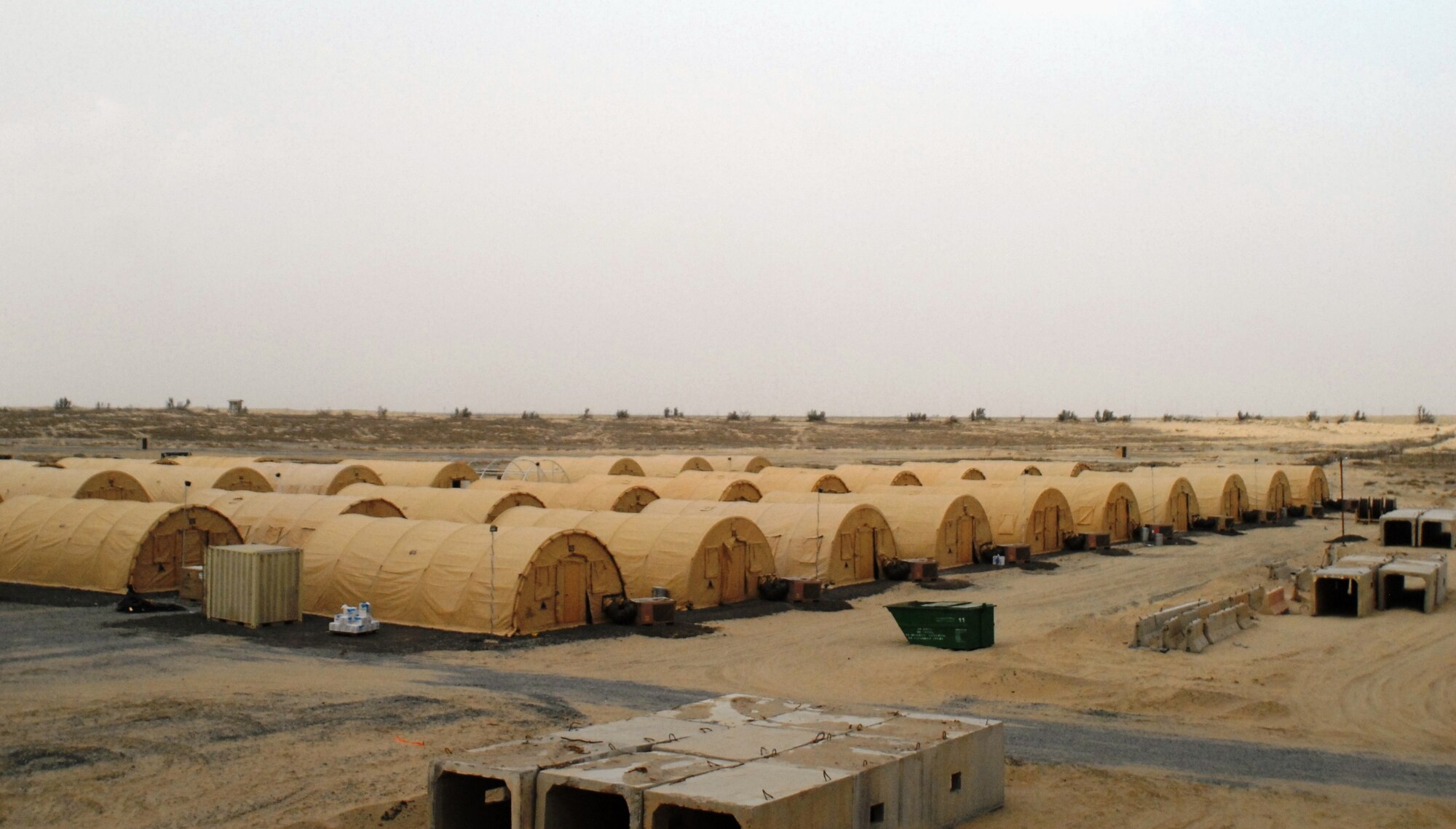 Newly erected tents are shown here March 19, 2015.  Members of the Indiana National Guard came together to build 60 tents for personnel deployed in support of Operation Inherent Resolve. (U.S. Air Force photo by 1st Lt. Sarah Ruckriegle)