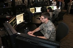 A Virginia National Guard Airman from the 192nd Intelligence Squadron demonstrates some of the intelligence, surveillance and reconnaissance capabilities they use to support operations across the globe March 17, 2015, at Langley AFB.