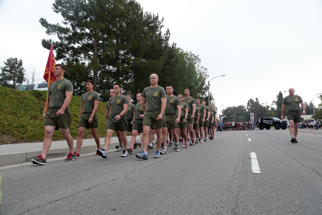 U.S. Marines with 13th Marine Expeditionary Unit participate in a 5k run in Anaheim, Calif. March 21, 2015. The city of Anaheim conducted a "Semper 5k" run in honor of the men and women who serve in the Armed Forces. (U.S. Marine Corps photo by Cpl. David Gonzalez, 13th Marine Expeditionary Combat Camera/ Released)