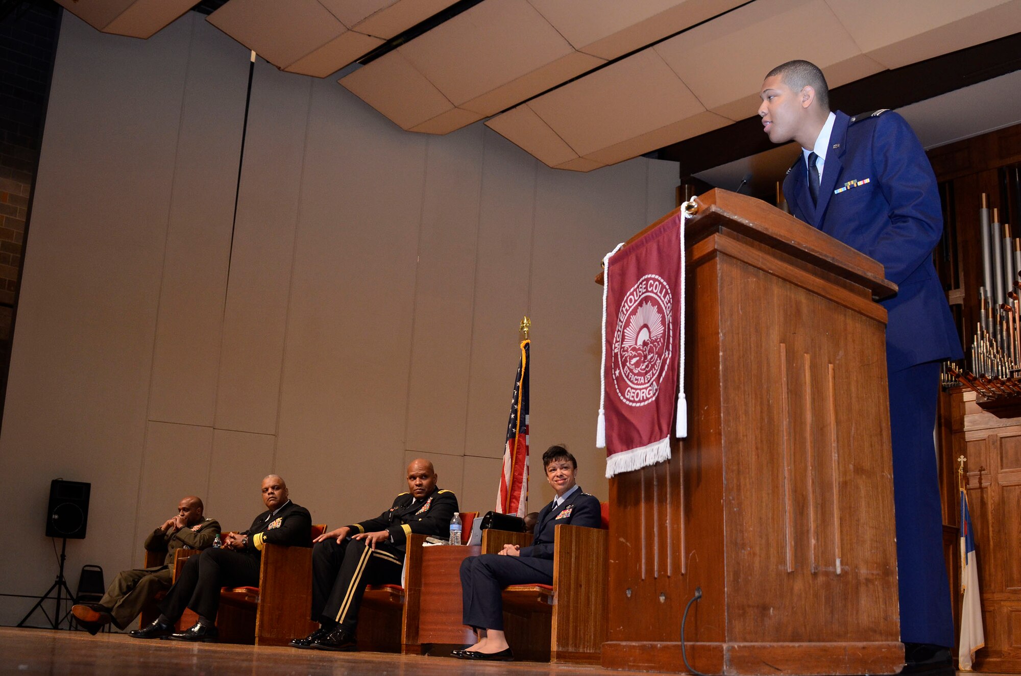 Air Force ROTC Cadet Jordan Rogers, Class of 2015, from Georgia Tech University, Atlanta, Ga. introduced Maj. Gen. Stayce Harris, 22nd Air Force commander as she participates in a panel discussion during Joint Service Military Day at Morehouse College, Atlanta, Ga. March 26, 2015. (U.S. Air Force photo/Don Peek)