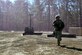 Tech. Sgt. Cory Little runs for cover during a mock attack from opposing forces, March 12, 2015, during Exercise Eagle Flag 15-2, at Joint Base McGuire-Dix-Lakehurst, New Jersey. Eagle Flag is designed for developing, testing and rehearsing the expeditionary combat support library of capabilities. Little is assigned to the 571st Global Mobility Readiness Squadron. (U.S. Air Force photo/Senior Airman Charles Rivezzo)