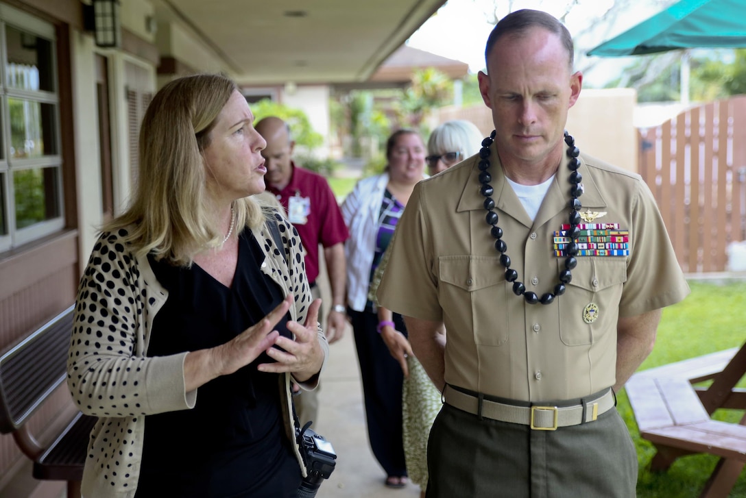 Julie Dugan, the business community outreach manager with the Hawaii Job Corps Center, provides a tour to Col. Eric W. Schaefer, the commanding officer for Marine Corps Base Hawaii, along with other Job Corps staff and base representatives March 24, 2015, at the Job Corps Center in Waimanalo. Since 1964, the Job Corps has been committed to offering students a safe, drug-free learning and training environment. (U.S. Marine Corps photo by Lance Cpl. Harley Thomas/released)