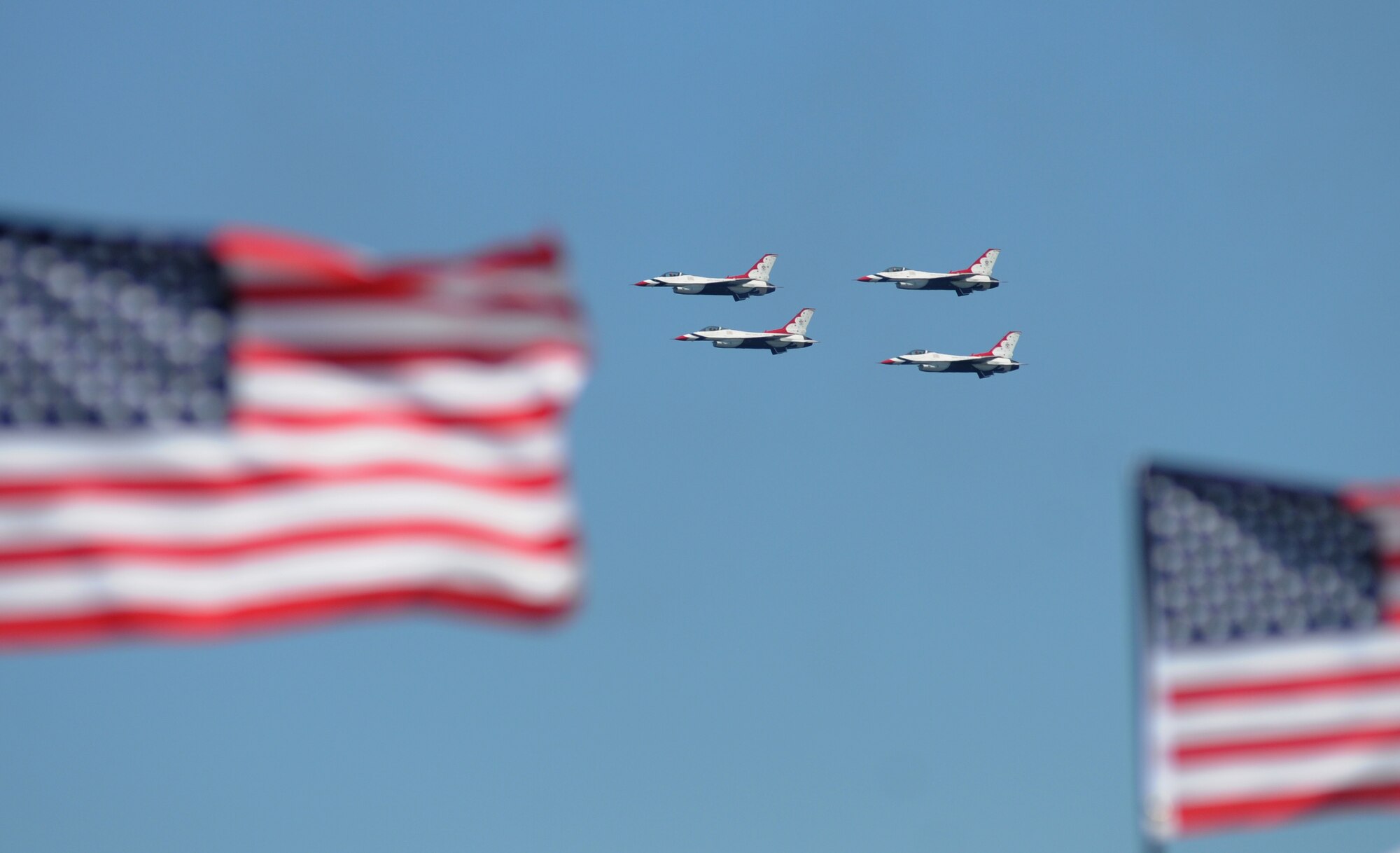 The U.S. Air Force Thunderbirds fly in formation during a practice session March 27, 2015, at Keesler Air Force Base, Miss. The Thunderbirds are headlining Keesler’s 2015 Air Show/Open House to be held March 28-29.  (U.S. Air Force photo by Kemberly Groue)