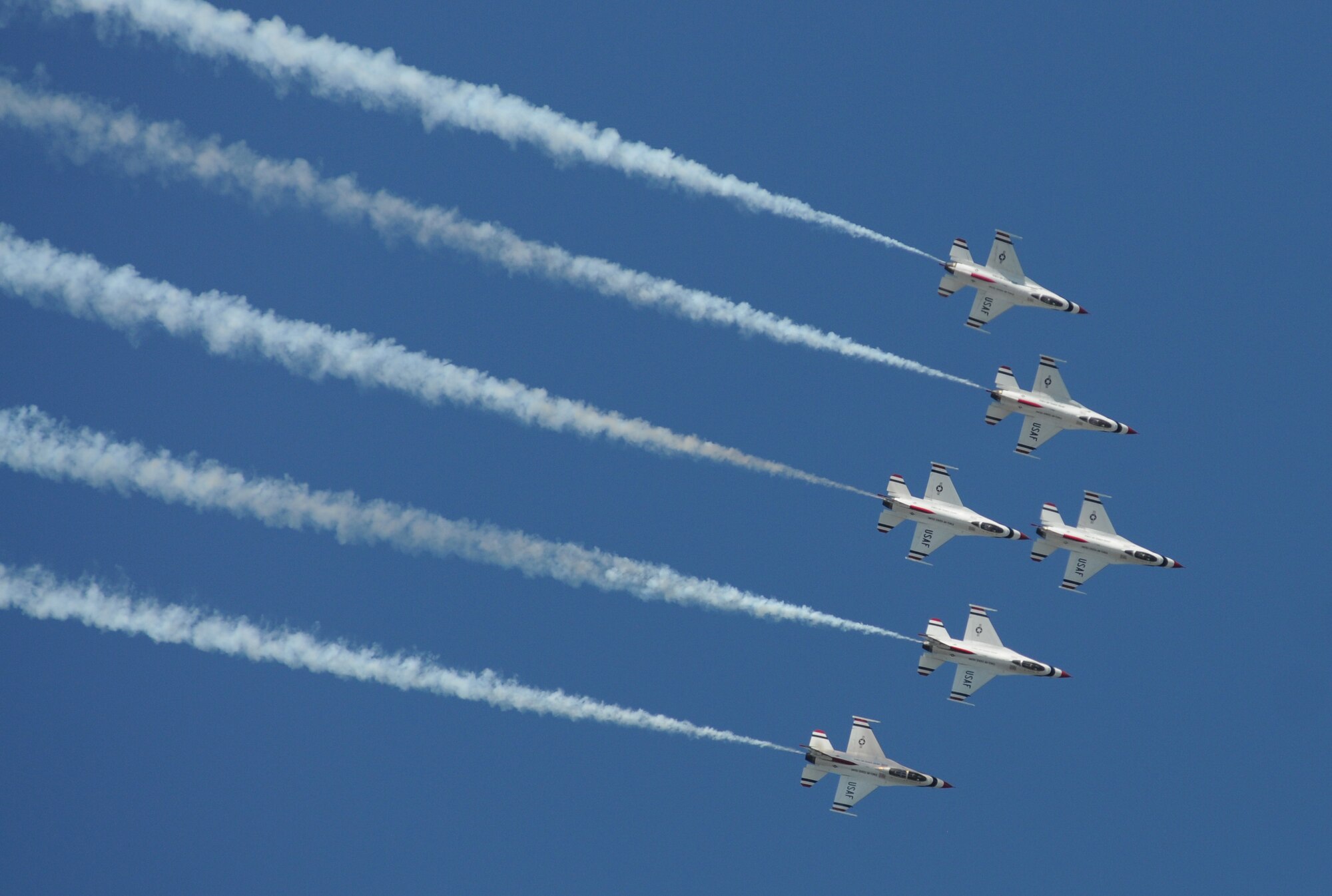 The U.S. Air Force Thunderbirds fly in formation during a practice session March 27, 2015, at Keesler Air Force Base, Miss. The Thunderbirds are headlining Keesler’s 2015 Air Show/Open House to be held March 28-29.  (U.S. Air Force photo by Kemberly Groue)