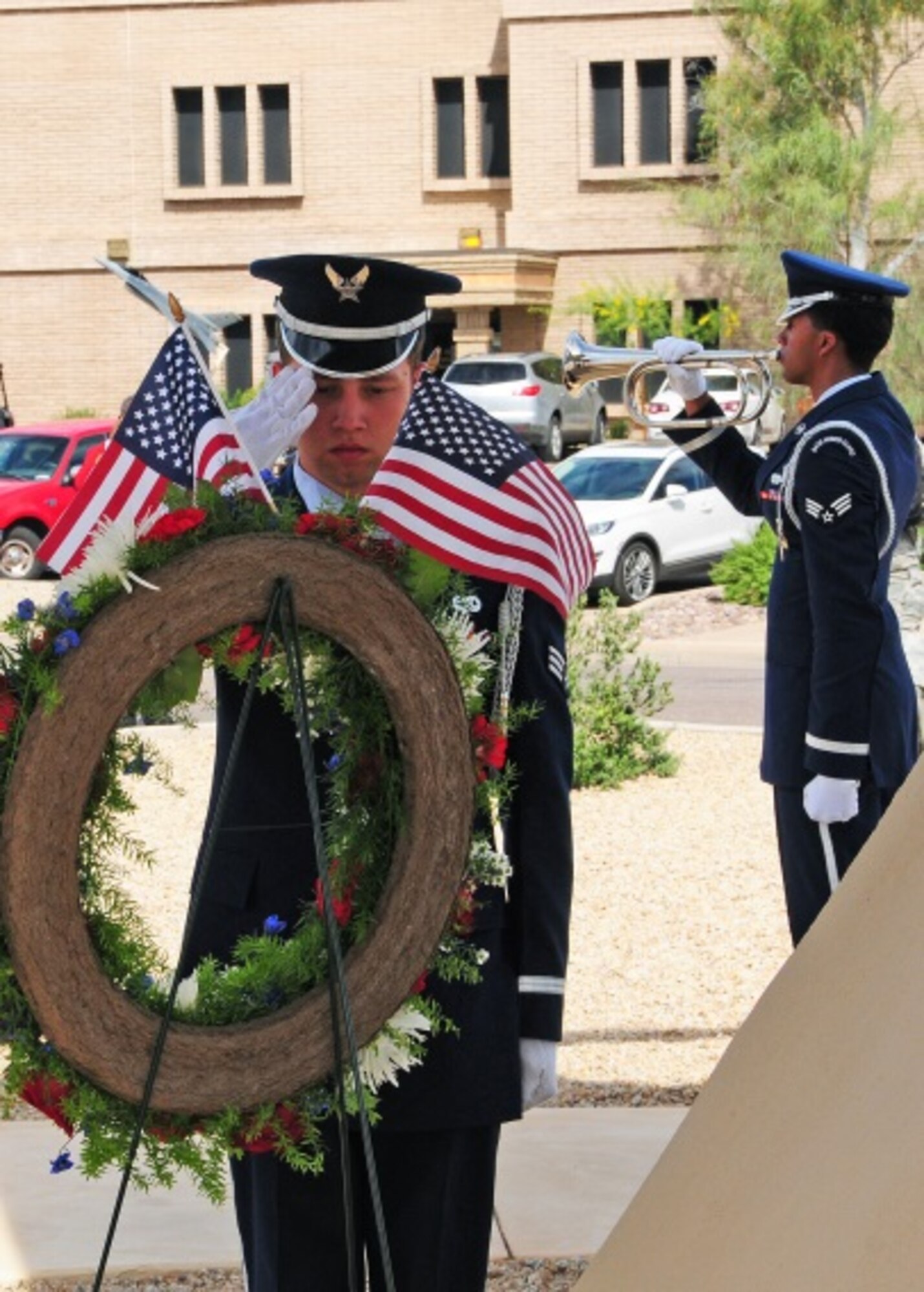 The Luke Air Force Base Honor Guard render military honors Mar 26 during the Tuskegee Airmen Commemoration Day at Luke Air Force Base, Ariz. (U.S. Air Force photo taken by Tech. Sgt. Louis Vega Jr.)