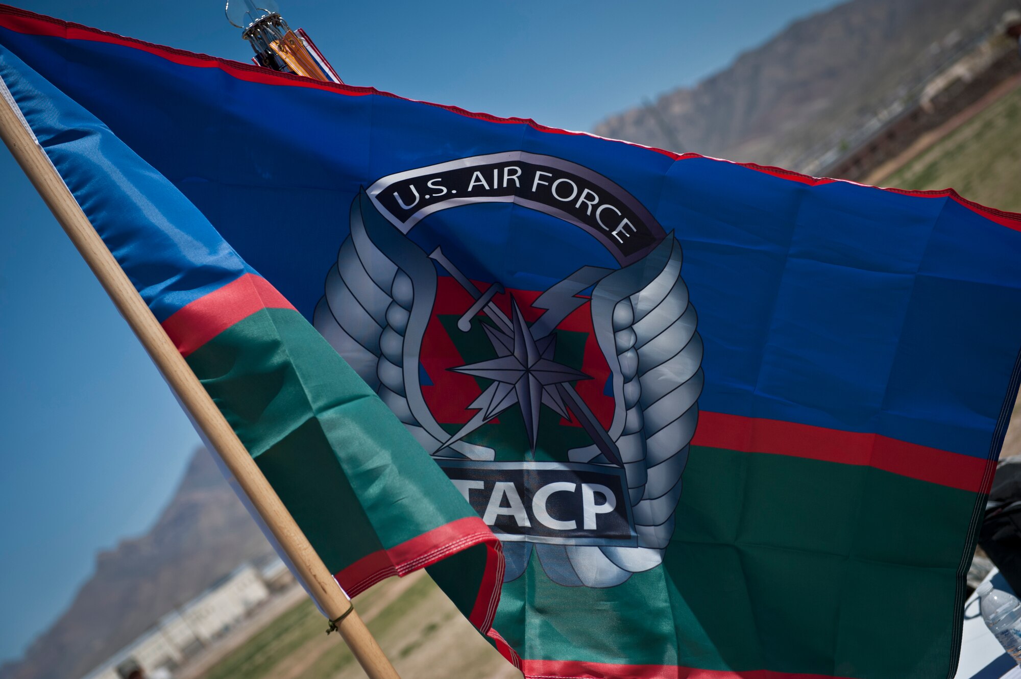 Shown is the Tactical Air Control Party flag, a symbol of honor, comradery and commitment among the TACP organization during the annual Remembrance Run at Fort Bliss, Texas, March 26, 2015. The flag was flown in honor of the TACP members who have made the ultimate sacrifice. (U.S. Air Force photo by Airman 1st Class Emily A. Kenney/Released)