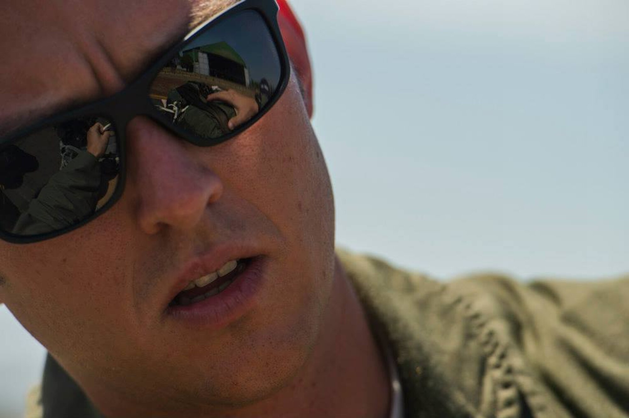 Master Sgt. Ryan O'Shea, loadmaster instructor for the 571st Mobility Support Advisory Squadron, inspects a Container Delivery System for proper knots prior to being loaded on a Colombian Air Force Casa 295 aircraft prior in preparation for the first air drop with United States Air Force personnel aboard on March 3, 2015 at Marandua Air Force Base in Colombia, South America. (Photo by U.S. Air Force Tech. Sgt. Matthew Hannen)