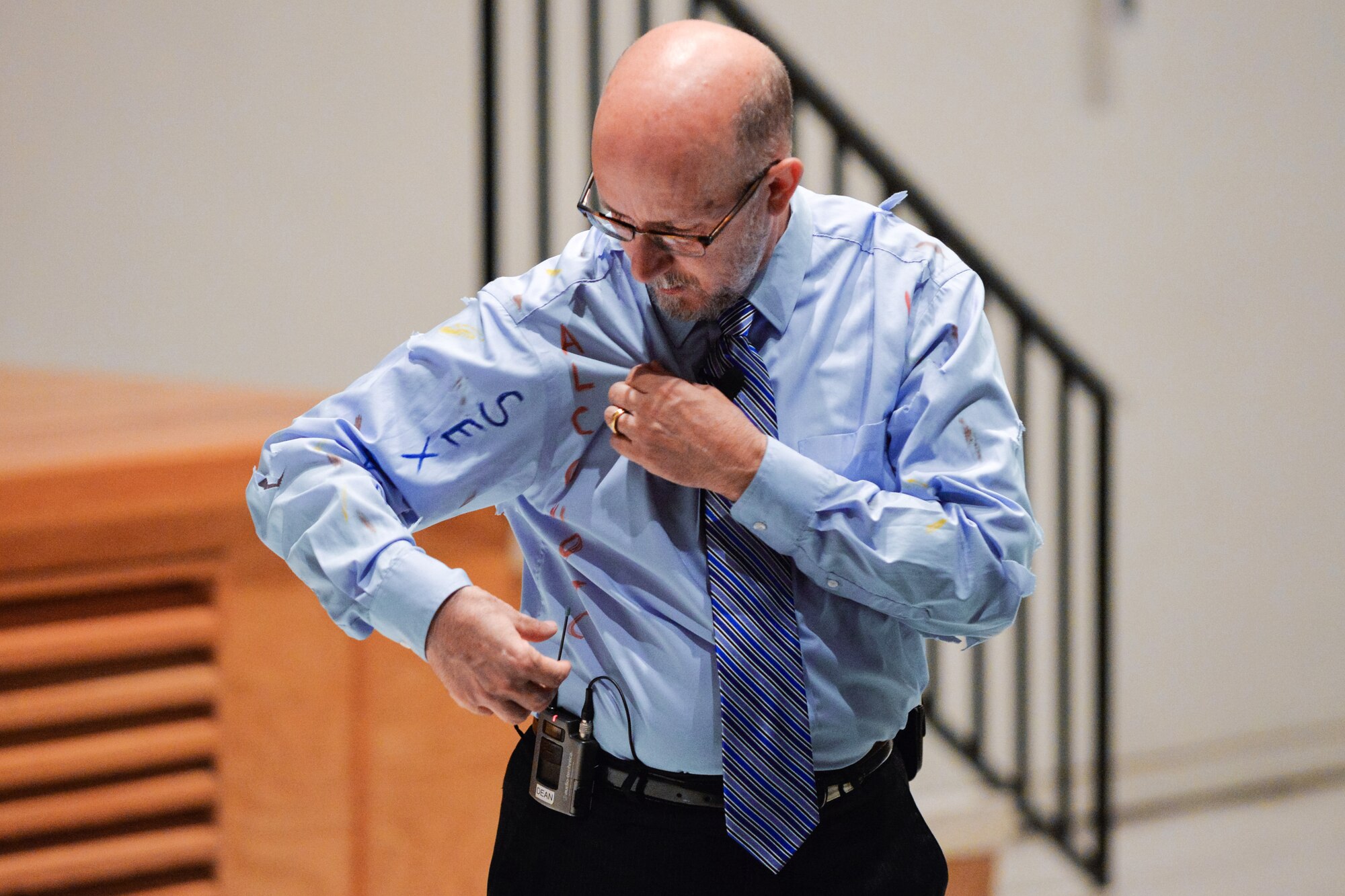 Russell Strand, chief of the behavioral sciences education and training division for the Army’s Military Police School, visually demonstrates the different layers, identities of people during a presentation on sexual assault March 19 in Fairchild Hall. 