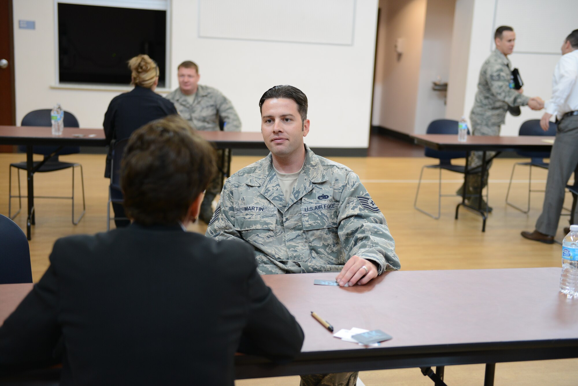 Tech. Sgt. Steve Martin, Detachment 12, 372nd Training Support Squadron fuels systems instructor, sits in a speed mentor session March 18 at Luke Air Force Base. The Blue Blazers, a group of Fighter Country Partnership Honorary Commanders alumni, put on the mentoring session to help Airmen who are considering transitioning to civilian careers at some point in their future. (U.S. Air Force photo/Senior Airman James Hensley)