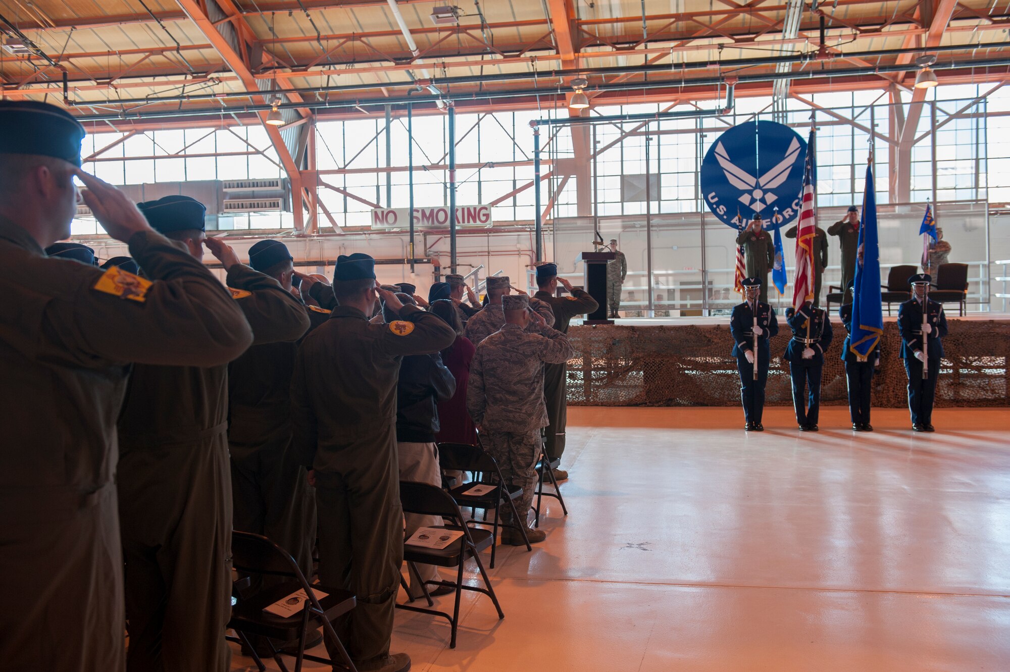 The Steel Talons Honor Guard presents the colors during the opening ceremony of the 54th Operations Support Squadron change of command at Holloman Air Force Base, N.M., March 27, 2015. In the ceremony, Lt. Col. Jerod Rick assumed command of the 54th OSS from Lt. Col. Marshall Chalverus. The 54th OSS is a fighter training unit that trains 45 percent of all F-16 Falcon student pilots. They also manage Intelligence, Air Crew Flight Equipment, and Simulator and Training Devices. (U.S. Air Force photo by Airman 1st Class Emily Kenney / Released)
