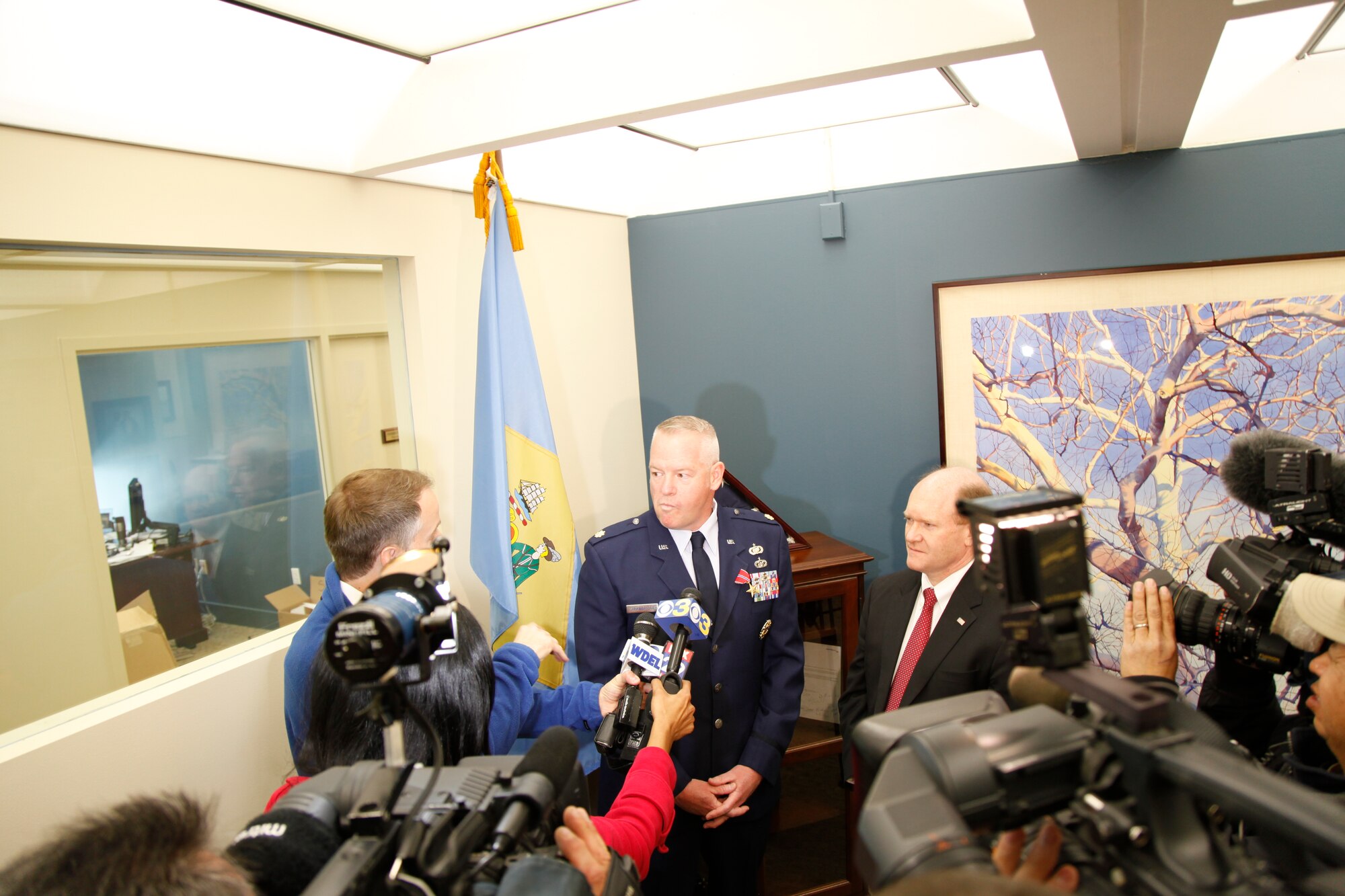 512th Airlift Wing intelligence officer, Major David Strawbridge of Middletown, Delaware, with U.S. Senator to Delaware Chris Coons, April 2014, after Coons presented the Bronze Star medal to Strawbridge for his efforts during his 2013 deployment to Afghanistan. Coons invited Strawbridge to the Capitol for an address to a joint session of Congress by Ashraf Ghani, president of Afghanistan, March 25, 2015. 