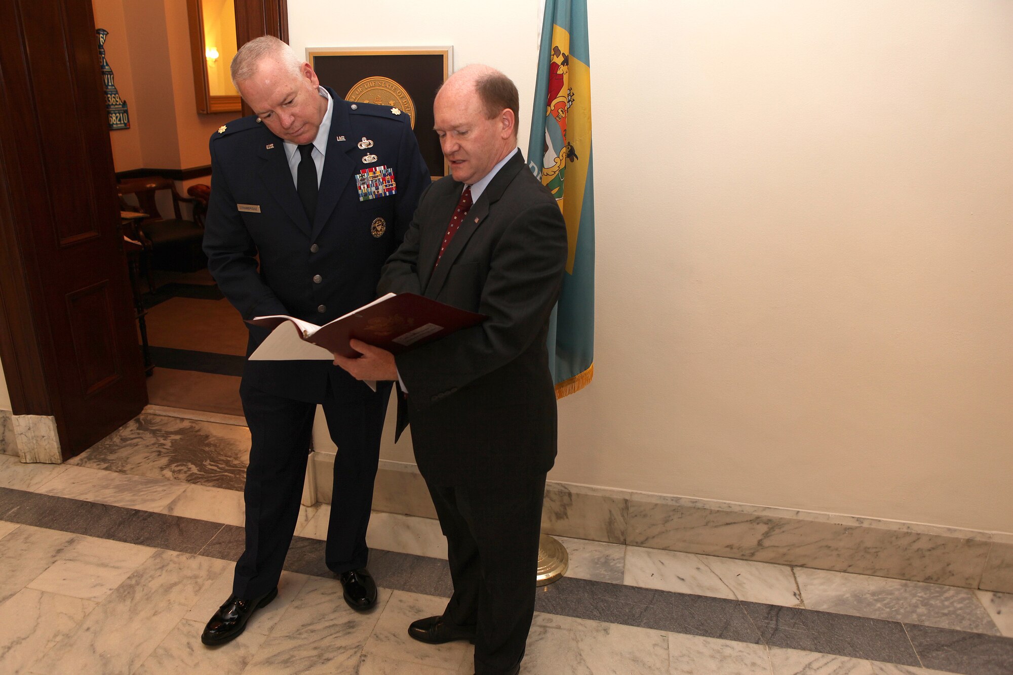 512th Airlift Wing intelligence officer, Major David Strawbridge of Middletown, Delaware, joins U.S. Senator to Delaware Chris Coons in the Capitol for an address to a joint session of Congress by Ashraf Ghani, president of Afghanistan, on March 25, 2015. Coons and Strawbridge met in January of 2013 in Afghanistan and have maintained communication since that time. (Photo Courtesy/Sen. Coons' Office)