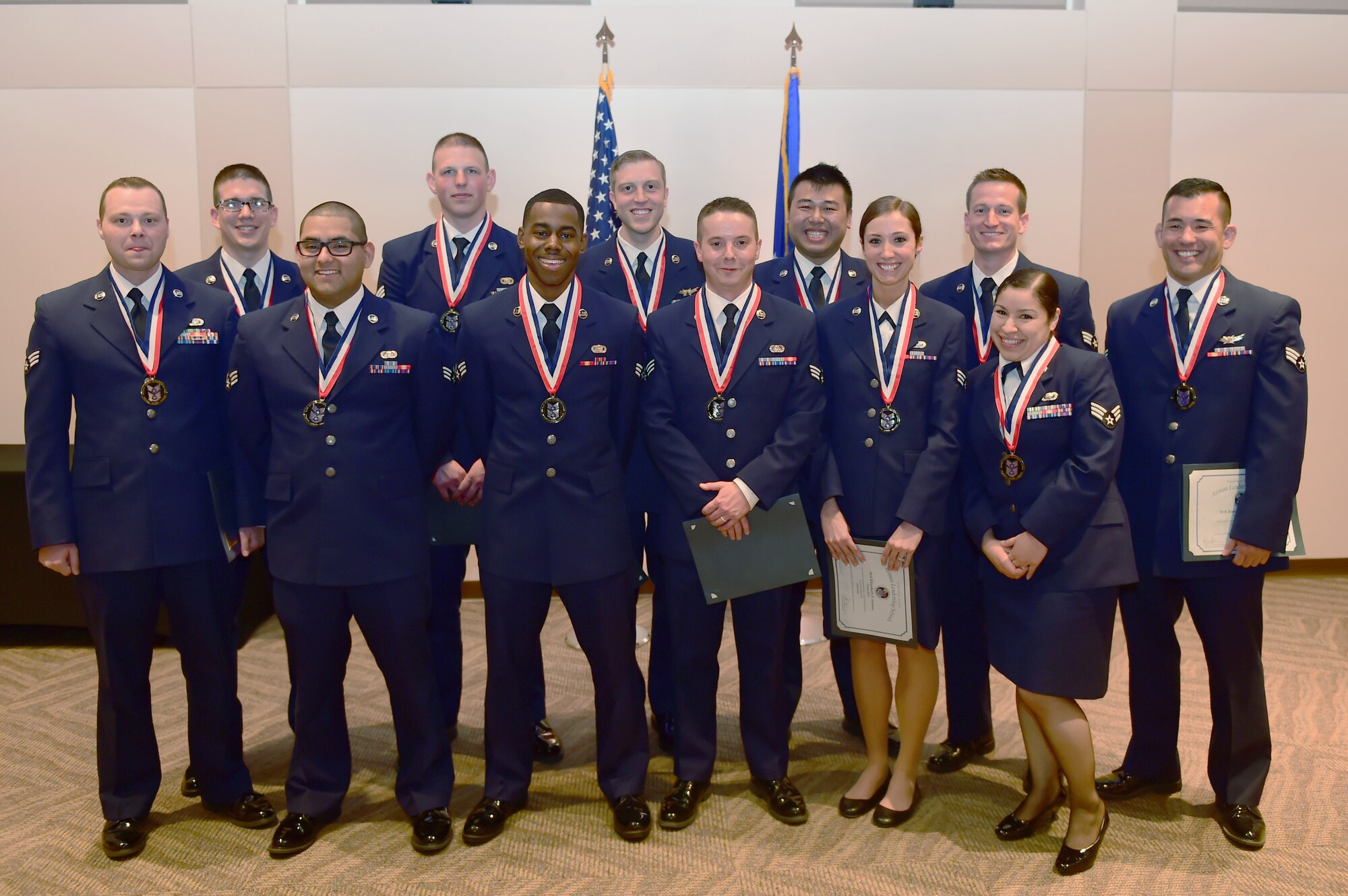 Buckley Airman Leadership School Class 15-C stands together after their graduation March 26, 2015, at the Leadership Development Center on Buckley Air Force Base, Colo. This graduation represents an important part of the enlisted force professional military education, teaching valuable skills required for supervisors. (U.S. Air Force photo by Airman 1st Class Luke Nowakowski/Released)